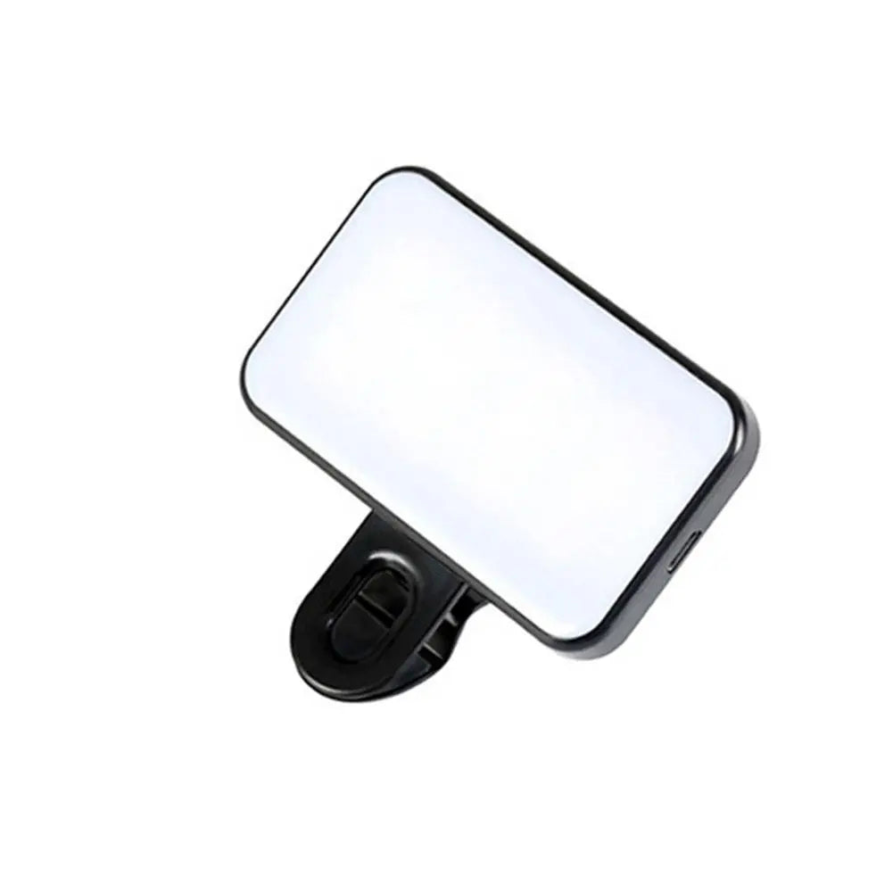 Black pocket LED video light with clip mount